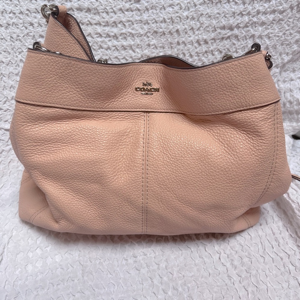 Coach light pink pebble leather Maggie purse.